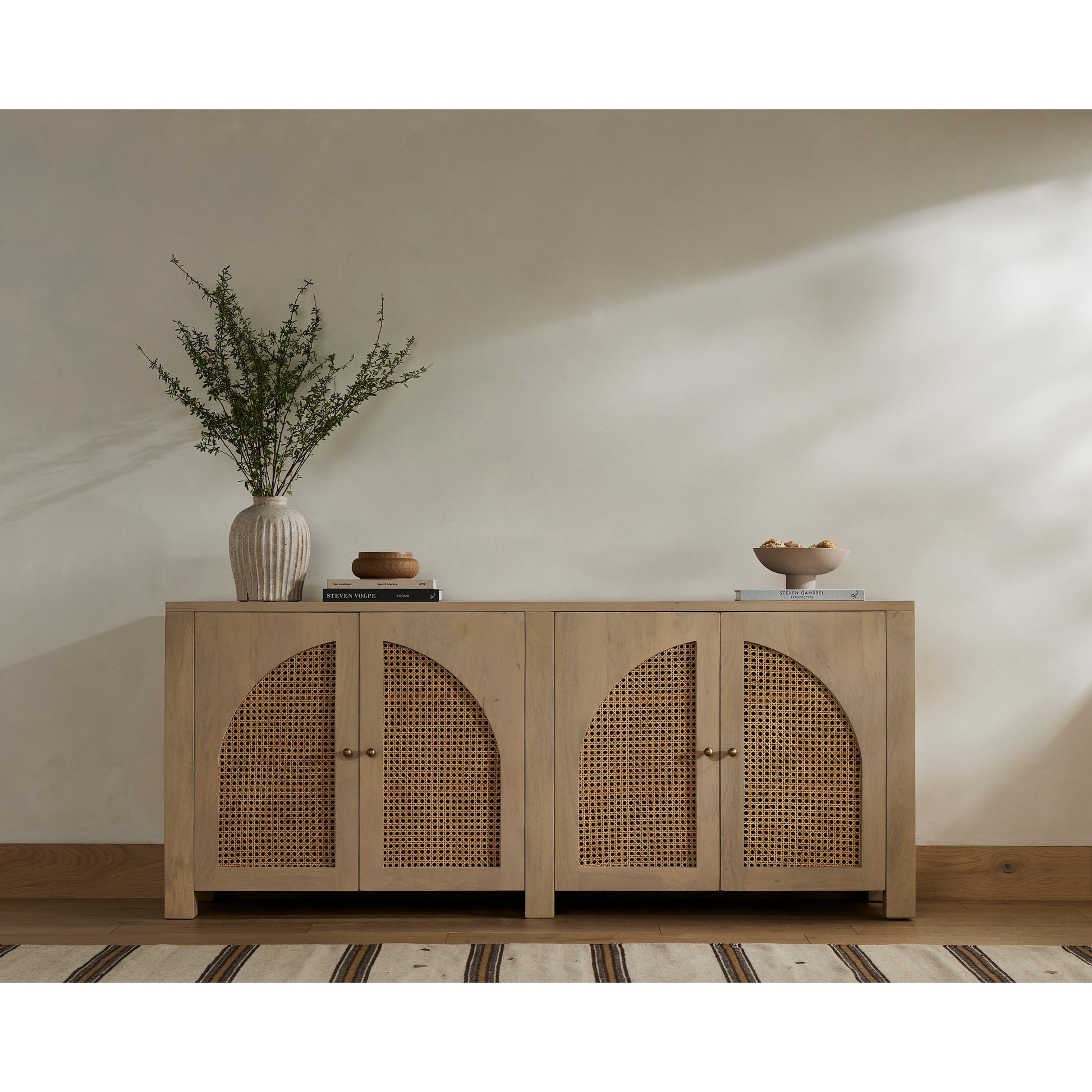 Tilda Sideboard by Four Hands. Made from solid mango, cane in a transitional style.