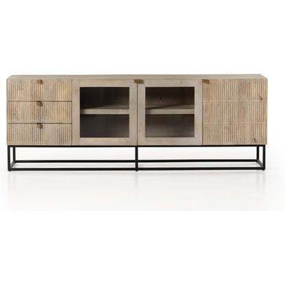 Kelby Media Console by Four Hands in gunmetal, aged brass, carved vintage brown, vintage brown. Made from solid mango, iron in a modern style.