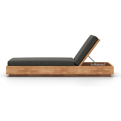 Kinta Outdoor Chaise by Four Hands in natural teak-fsc. Made from 100% olefin, solid fsc®-certified teak, 91% polyurethane foam pad, 9% polyester fiber batting in a rustic style.