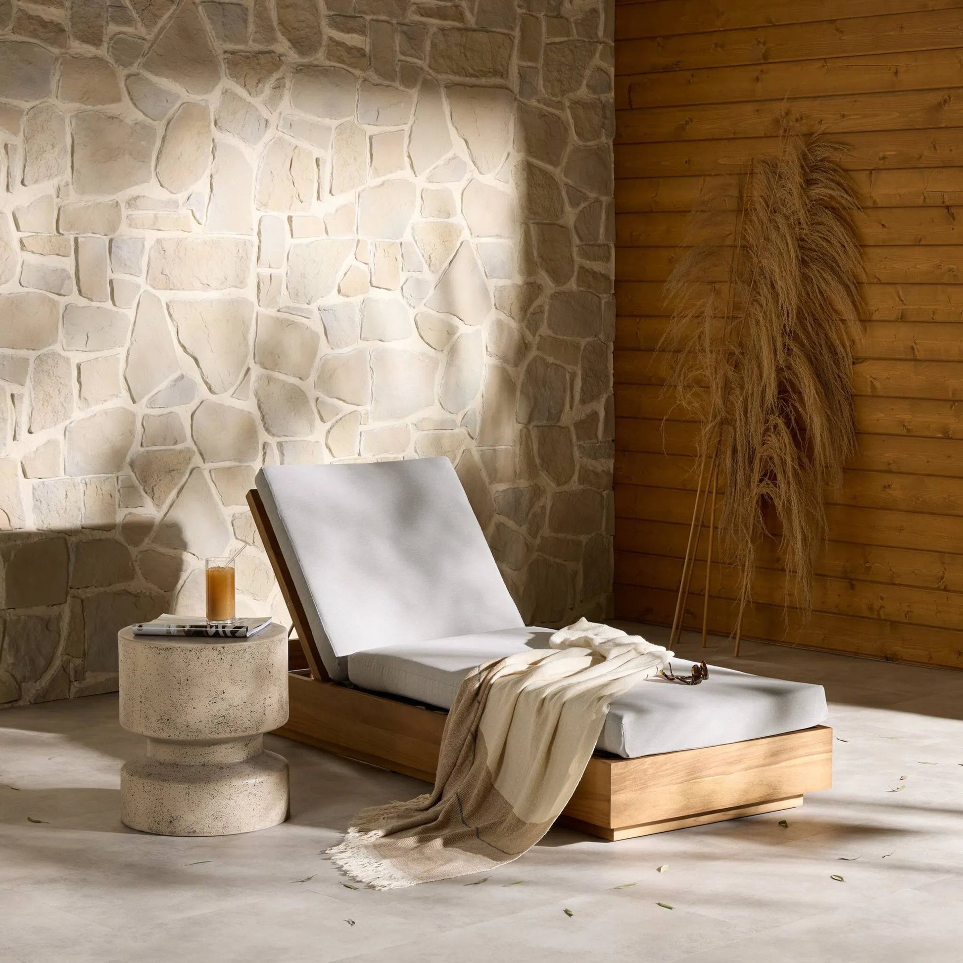 Kinta Outdoor Chaise by Four Hands in natural teak-fsc. Made from 100% olefin, solid fsc®-certified teak, 91% polyurethane foam pad, 9% polyester fiber batting in a rustic style.