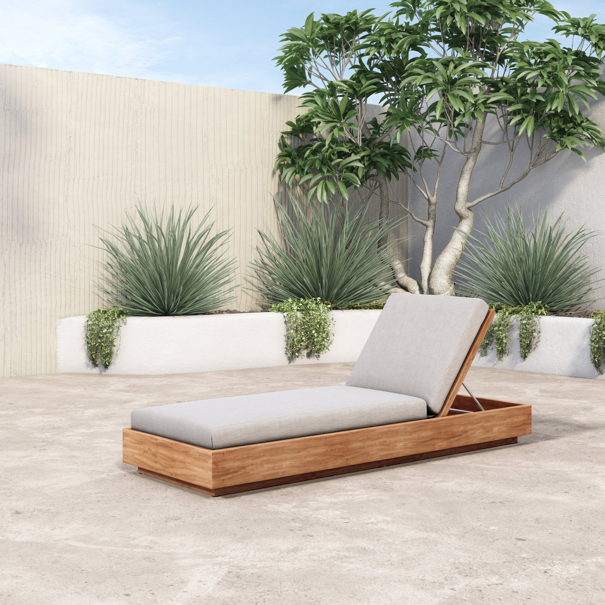 Kinta Outdoor Chaise by Four Hands in natural teak-fsc. Made from 100% olefin, solid fsc®-certified teak, 91% polyurethane foam pad, 9% polyester fiber batting in a rustic style.