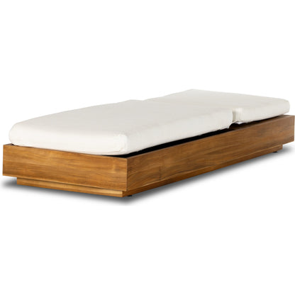 Kinta Outdoor Chaise by Four Hands in natural teak-fsc. Made from 100% olefin, solid fsc®-certified teak, 91% polyurethane foam pad, 9% polyester fiber batting in a rustic style.