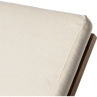 Kinta Outdoor Chaise by Four Hands in natural teak-fsc. Made from 100% olefin, solid fsc®-certified teak, 91% polyurethane foam pad, 9% polyester fiber batting in a rustic style.