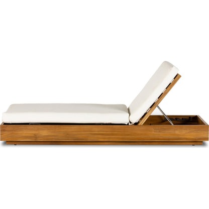 Kinta Outdoor Chaise by Four Hands in natural teak-fsc. Made from 100% olefin, solid fsc®-certified teak, 91% polyurethane foam pad, 9% polyester fiber batting in a rustic style.