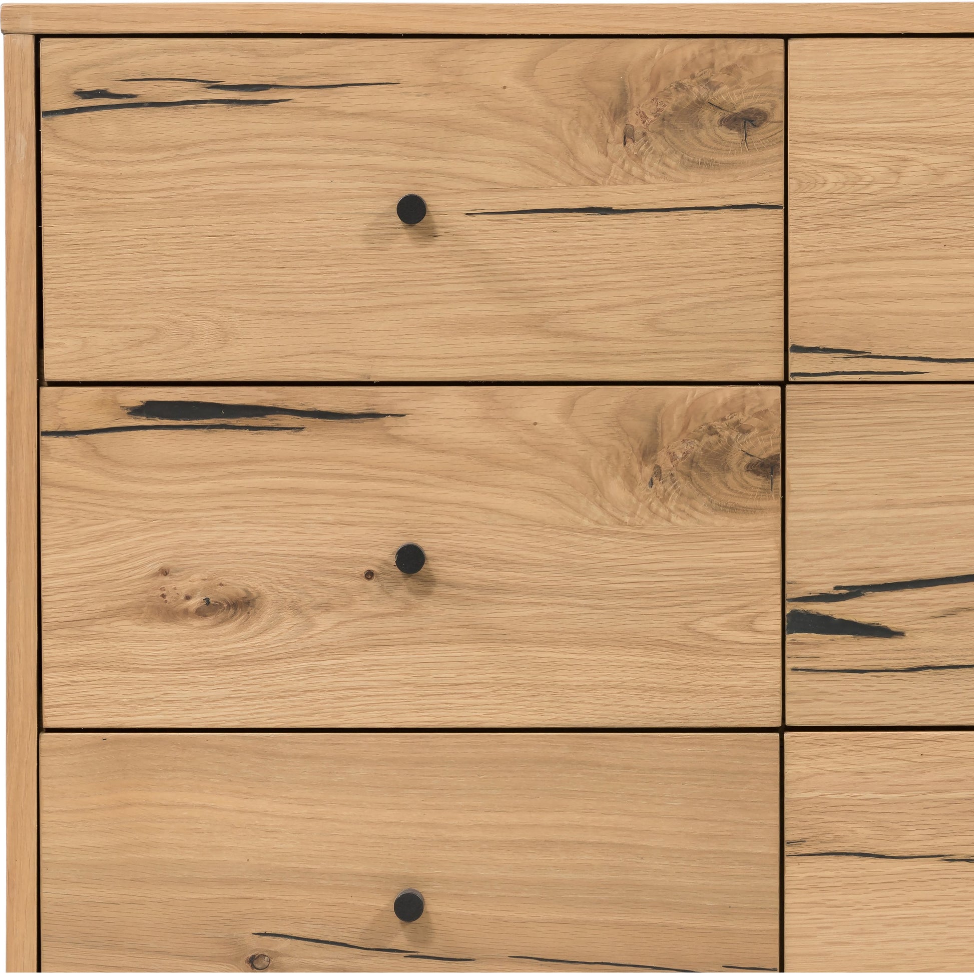 Eaton 9 Drawer Dresser by Four Hands in amber oak resin. Made from thick oak veneer, iron in a rustic style.