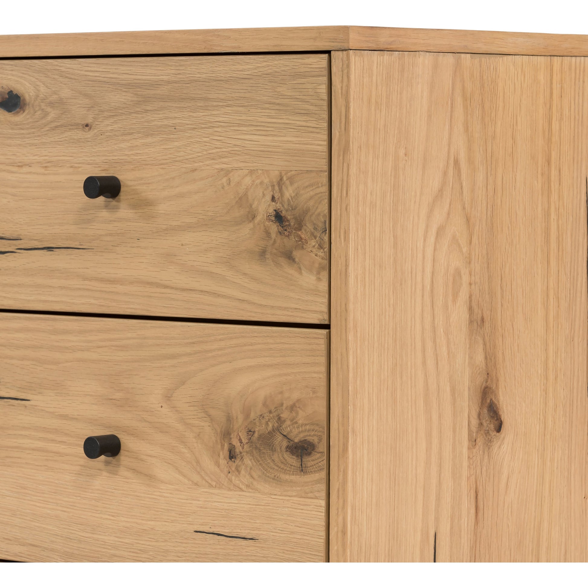 Eaton 9 Drawer Dresser by Four Hands in amber oak resin. Made from thick oak veneer, iron in a rustic style.