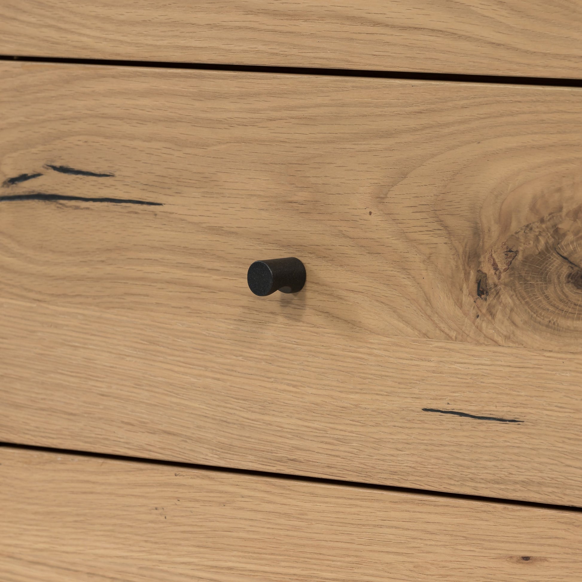 Eaton 9 Drawer Dresser by Four Hands in amber oak resin. Made from thick oak veneer, iron in a rustic style.