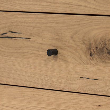 Eaton 9 Drawer Dresser by Four Hands in amber oak resin. Made from thick oak veneer, iron in a rustic style.