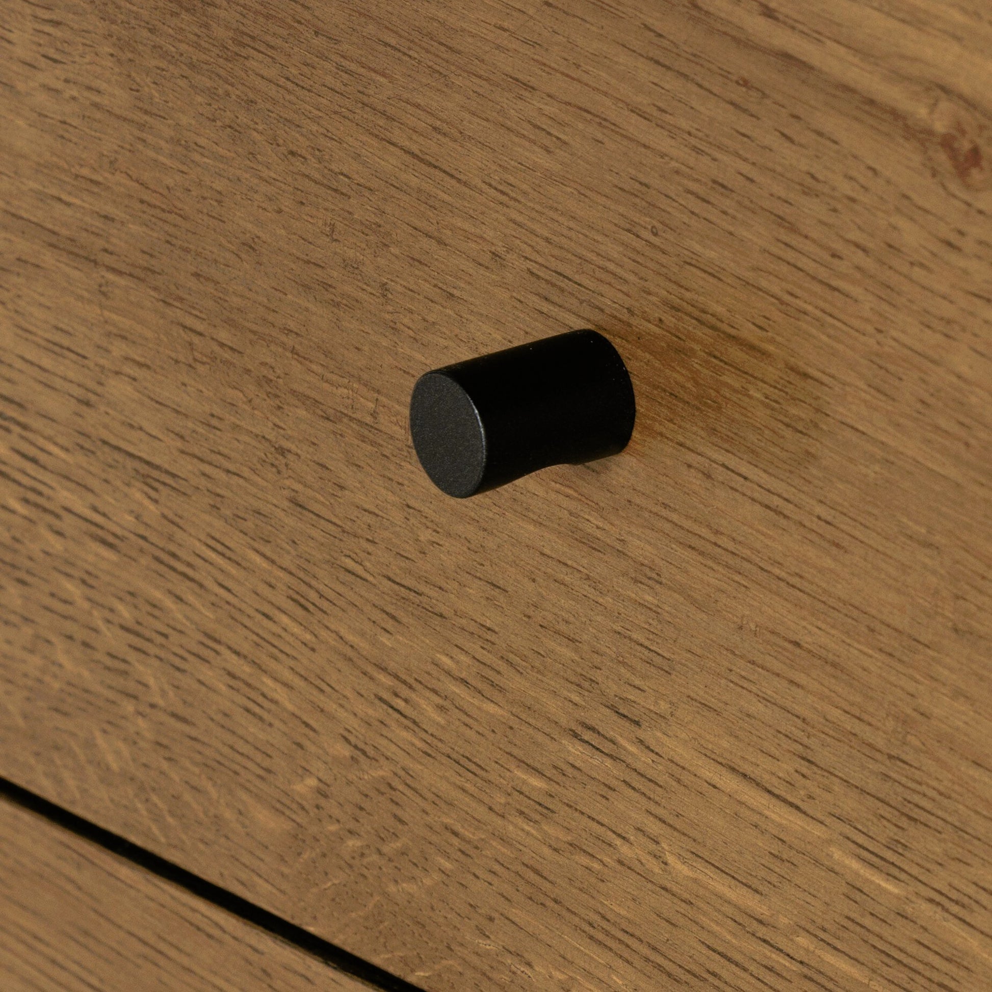 Eaton 9 Drawer Dresser by Four Hands in amber oak resin. Made from thick oak veneer, iron in a rustic style.