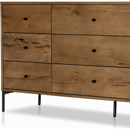 Eaton 9 Drawer Dresser by Four Hands in amber oak resin. Made from thick oak veneer, iron in a rustic style.