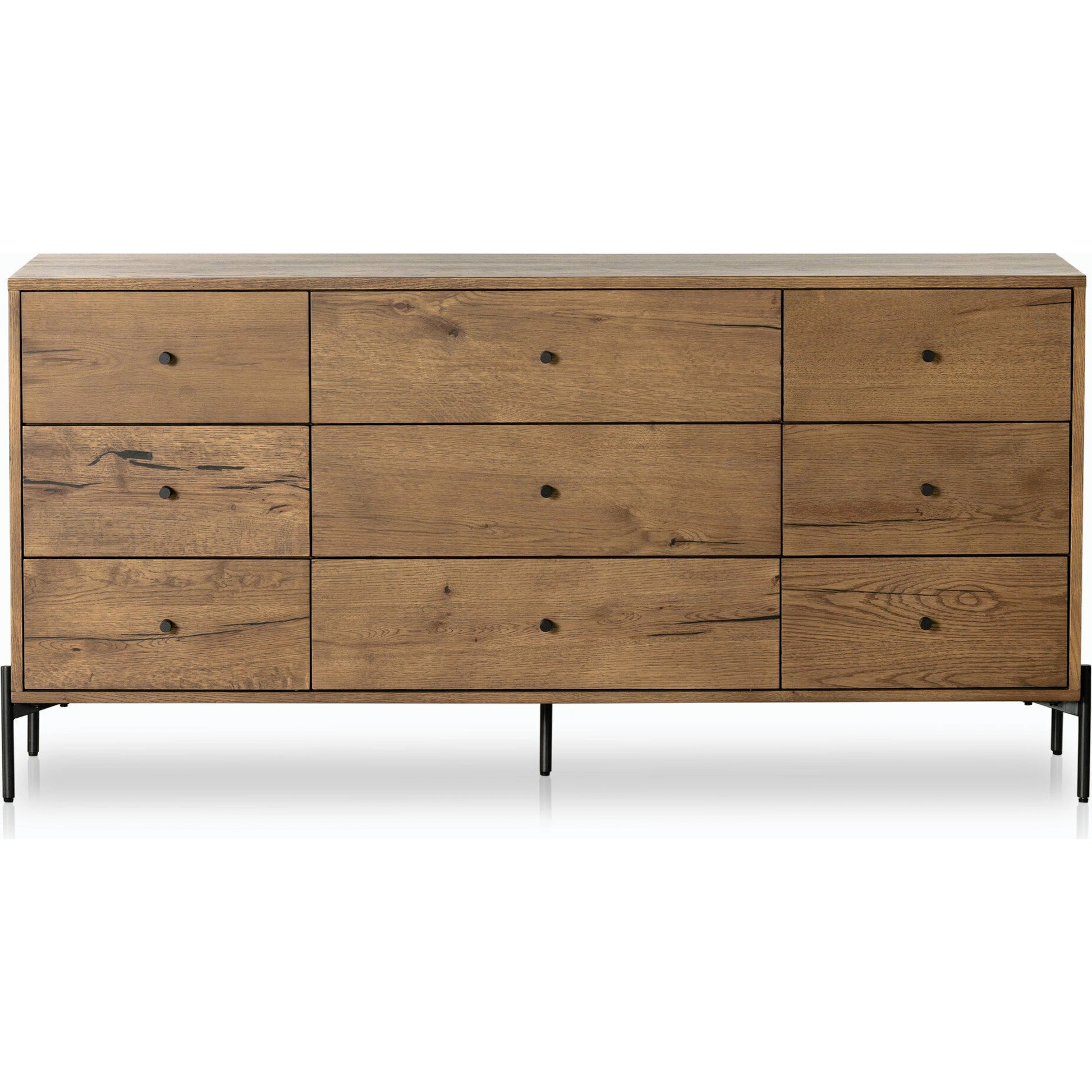 Eaton 9 Drawer Dresser by Four Hands in amber oak resin. Made from thick oak veneer, iron in a rustic style.