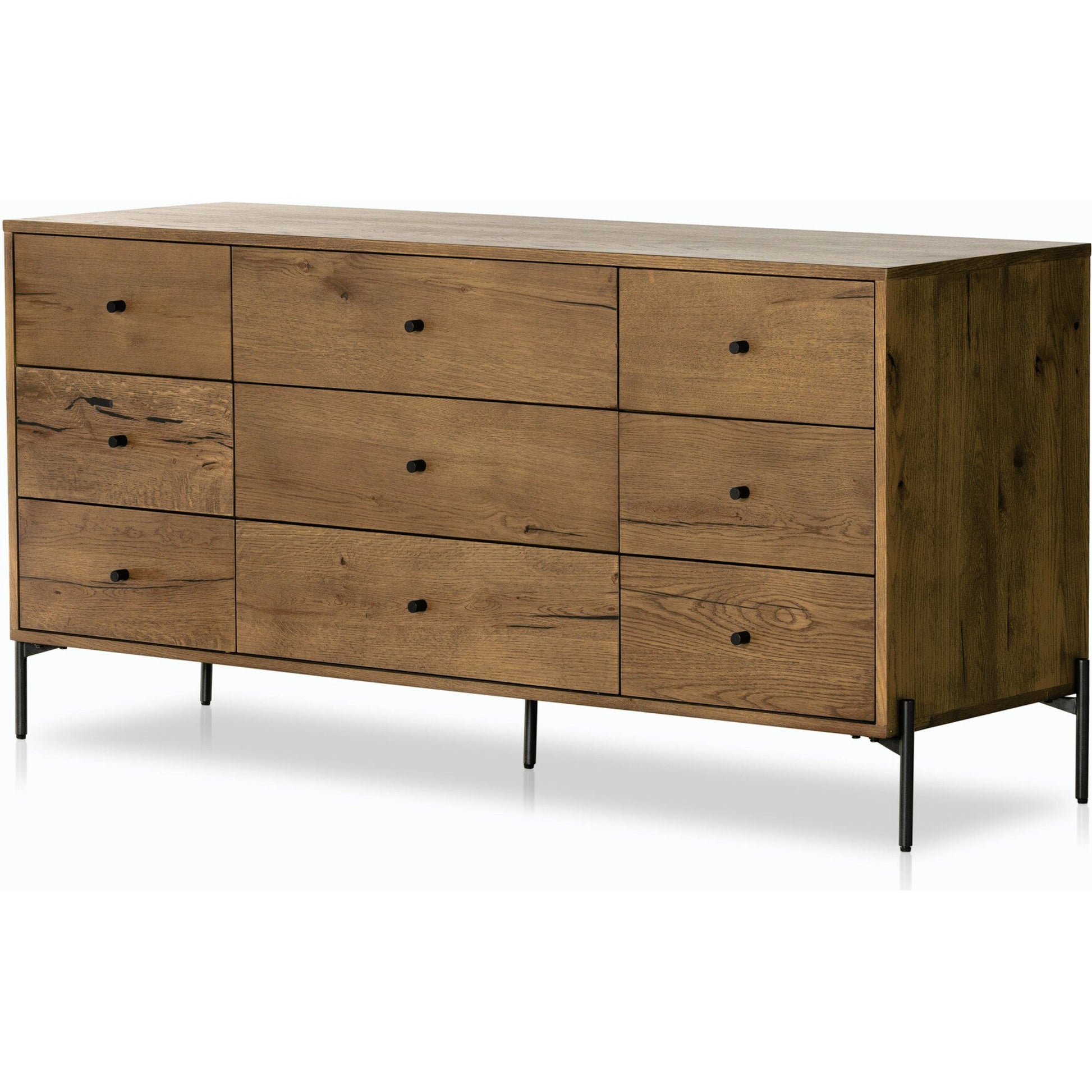 Eaton 9 Drawer Dresser by Four Hands in amber oak resin. Made from thick oak veneer, iron in a rustic style.
