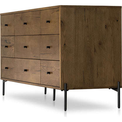 Eaton 9 Drawer Dresser by Four Hands in amber oak resin. Made from thick oak veneer, iron in a rustic style.