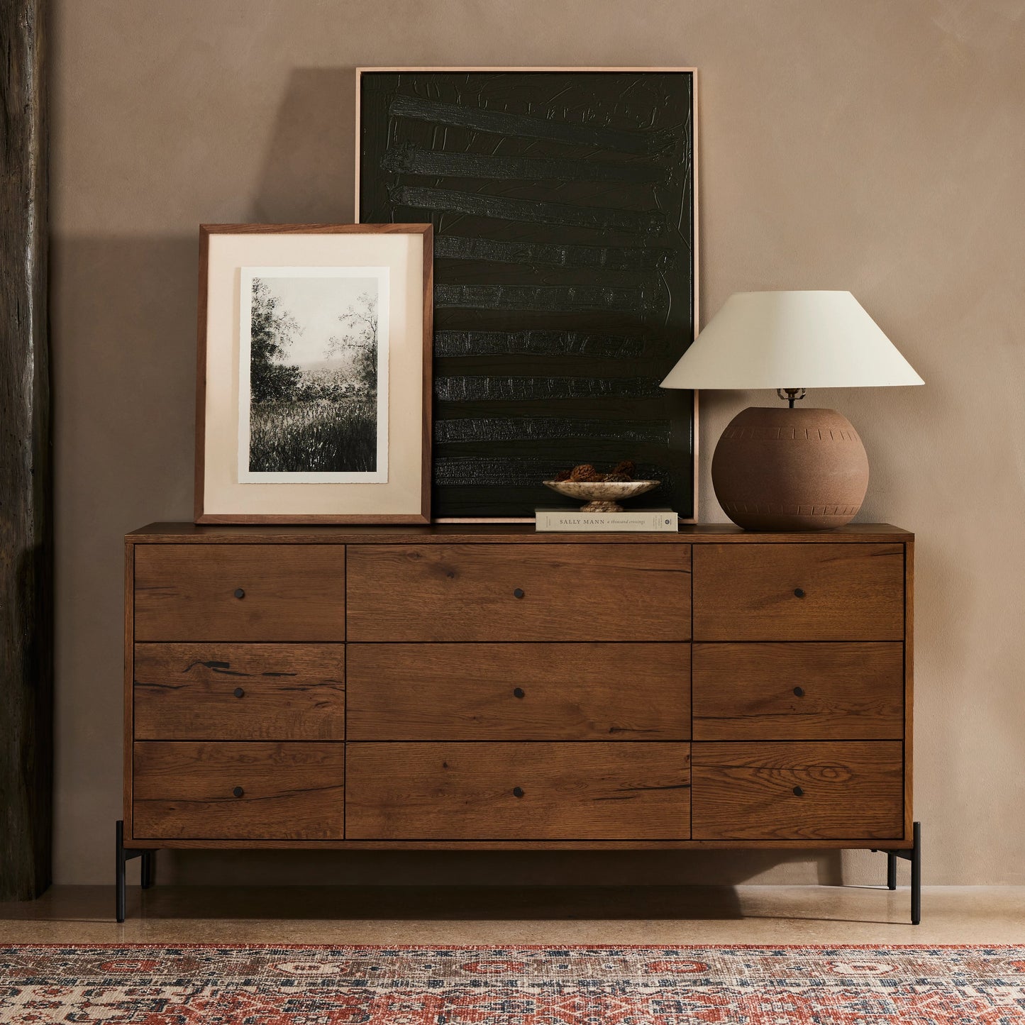 013 SI-1977261 | Lifestyle | Eaton 9 Drawer Dresser by Four Hands in amber oak resin. Made from thick oak veneer, iron in a rustic style.