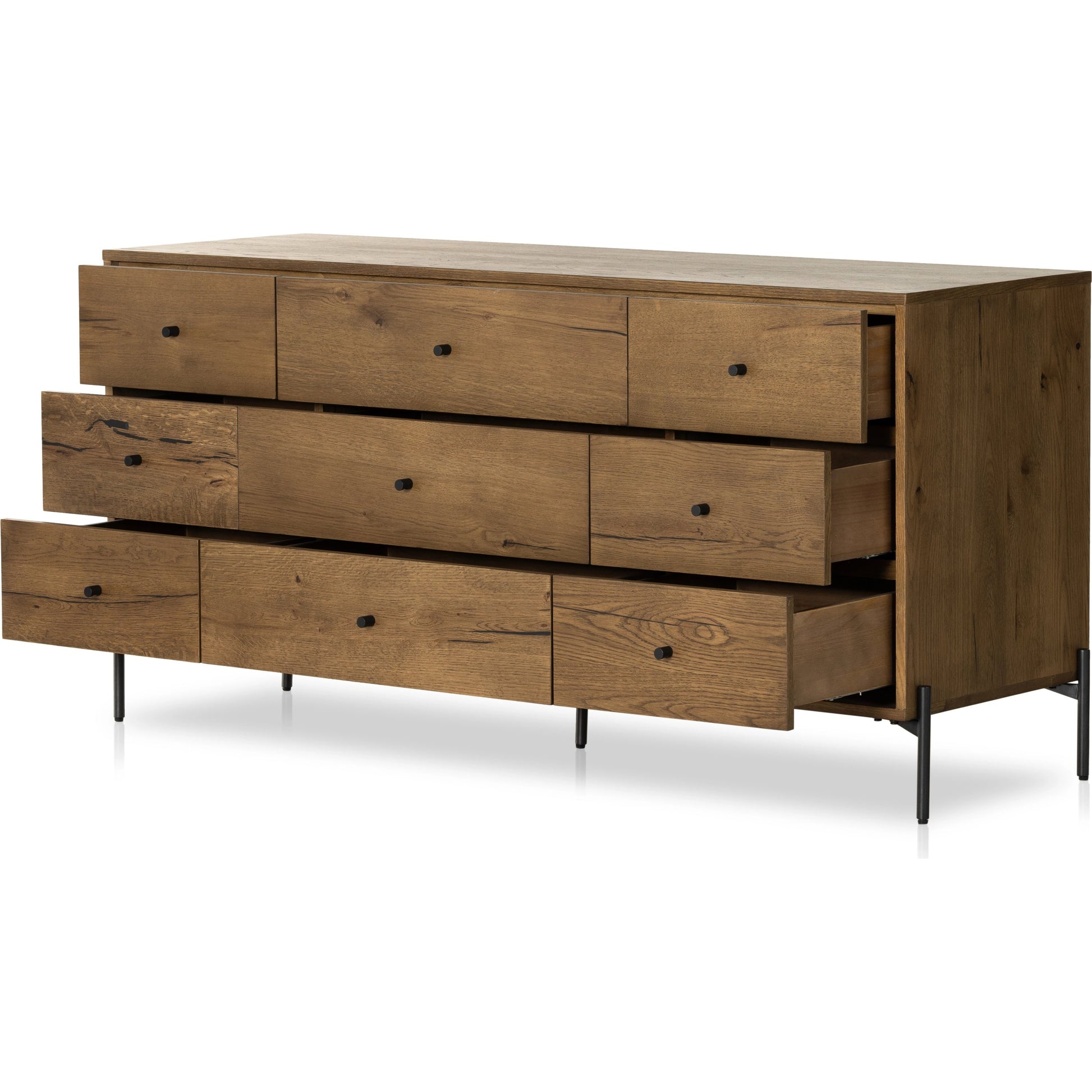 Eaton 9 Drawer Dresser by Four Hands in amber oak resin. Made from thick oak veneer, iron in a rustic style.