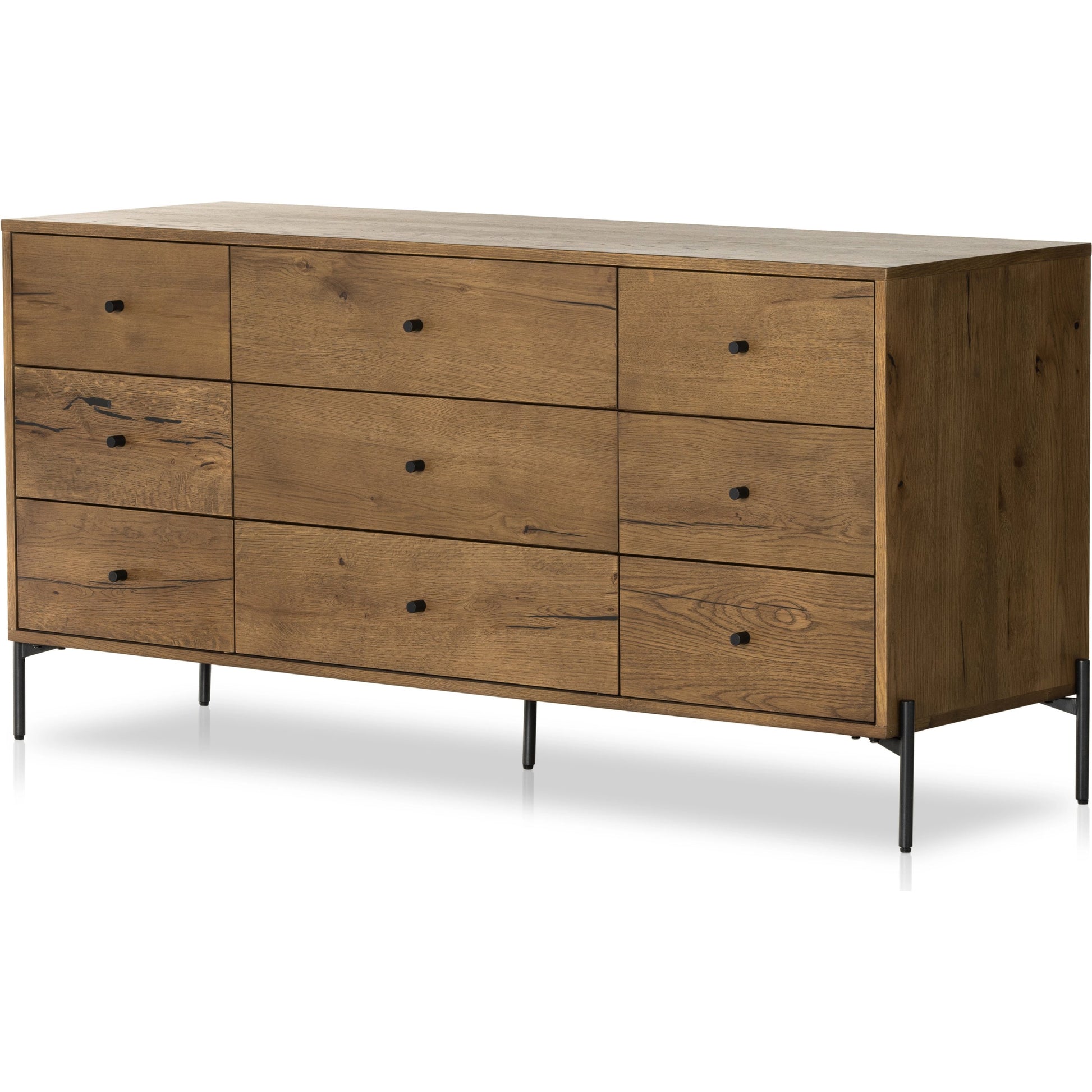 Eaton 9 Drawer Dresser by Four Hands in amber oak resin. Made from thick oak veneer, iron in a rustic style.