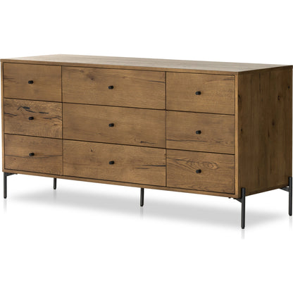 Eaton 9 Drawer Dresser by Four Hands in amber oak resin. Made from thick oak veneer, iron in a rustic style.
