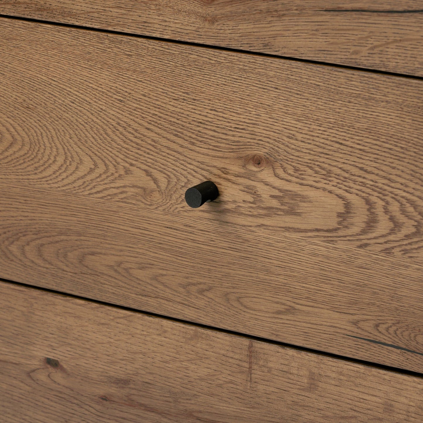 021 SI-1977260 | Closeup | Eaton 5 Drawer Dresser by Four Hands in dark gunmetal, amber oak resin. Made from thick oak veneer, iron in a rustic style.