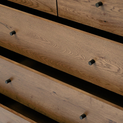 Eaton 5 Drawer Dresser by Four Hands in dark gunmetal, amber oak resin. Made from thick oak veneer, iron in a rustic style.