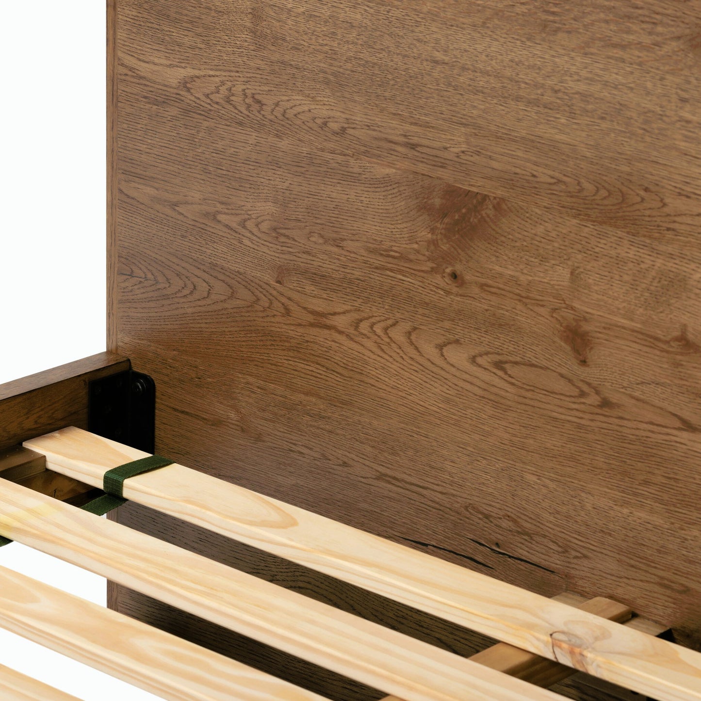 036 SI-1980352 | Closeup | Eaton Bed by Four Hands in amber oak resin. Made from thick oak veneer, iron in a rustic style.