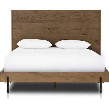 Eaton Bed by Four Hands in amber oak resin. Made from thick oak veneer, iron in a rustic style.