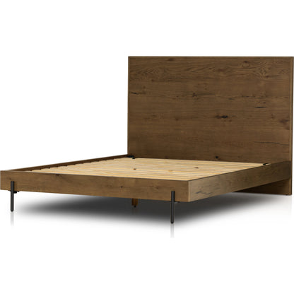 Eaton Bed by Four Hands in amber oak resin. Made from thick oak veneer, iron in a rustic style.