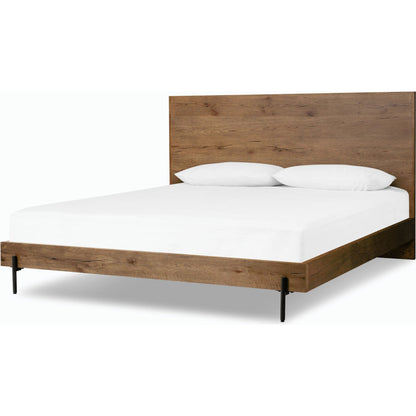 Eaton Bed by Four Hands in amber oak resin. Made from thick oak veneer, iron in a rustic style.