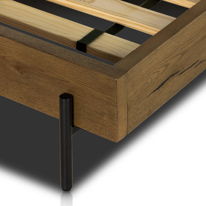 Eaton Bed by Four Hands in amber oak resin. Made from thick oak veneer, iron in a rustic style.