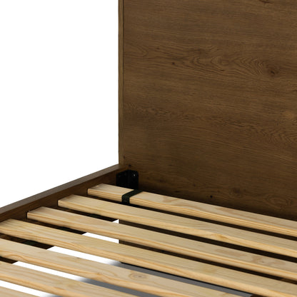 Eaton Bed by Four Hands in amber oak resin. Made from thick oak veneer, iron in a rustic style.