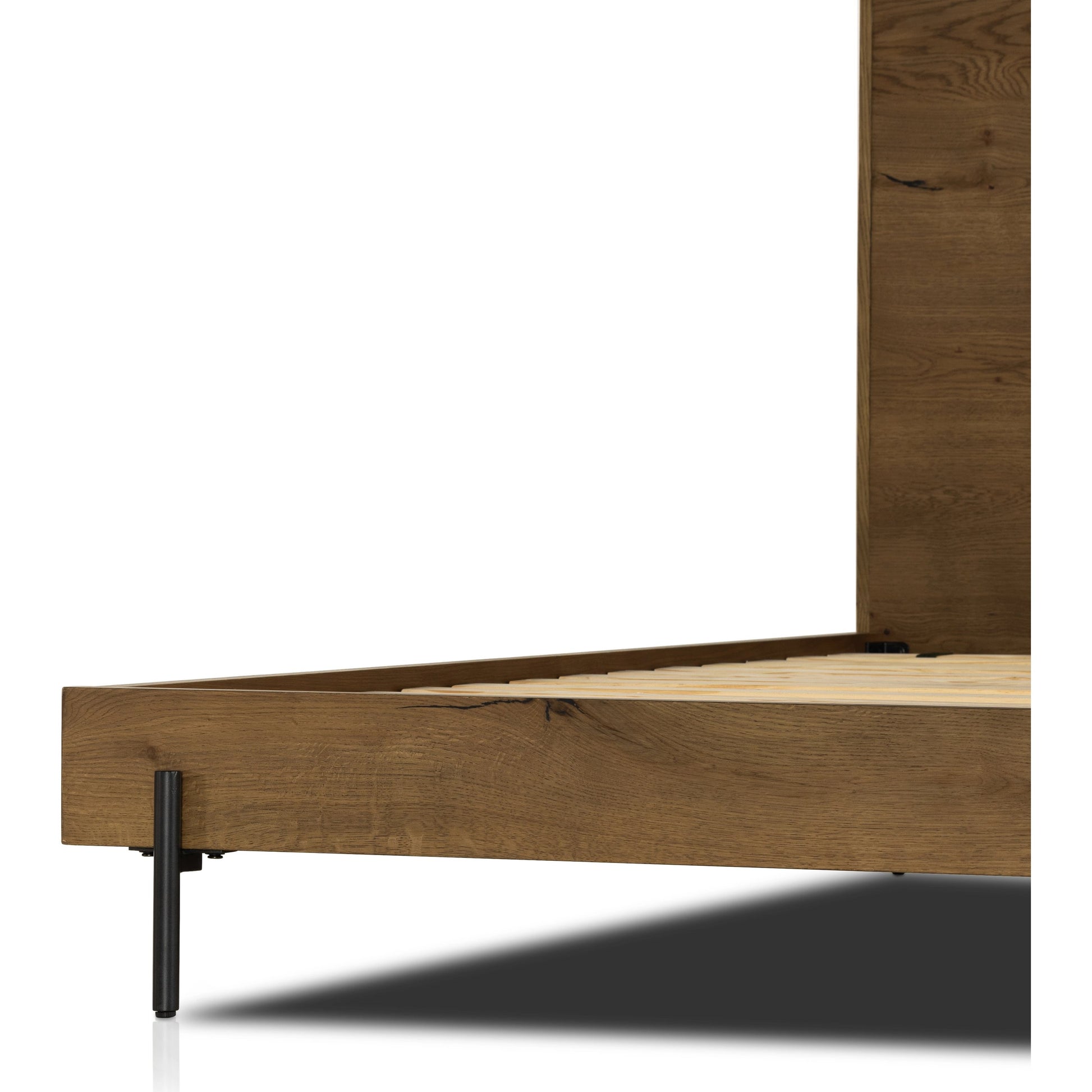 Eaton Bed by Four Hands in amber oak resin. Made from thick oak veneer, iron in a rustic style.