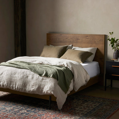 Eaton Bed by Four Hands in amber oak resin. Made from thick oak veneer, iron in a rustic style.