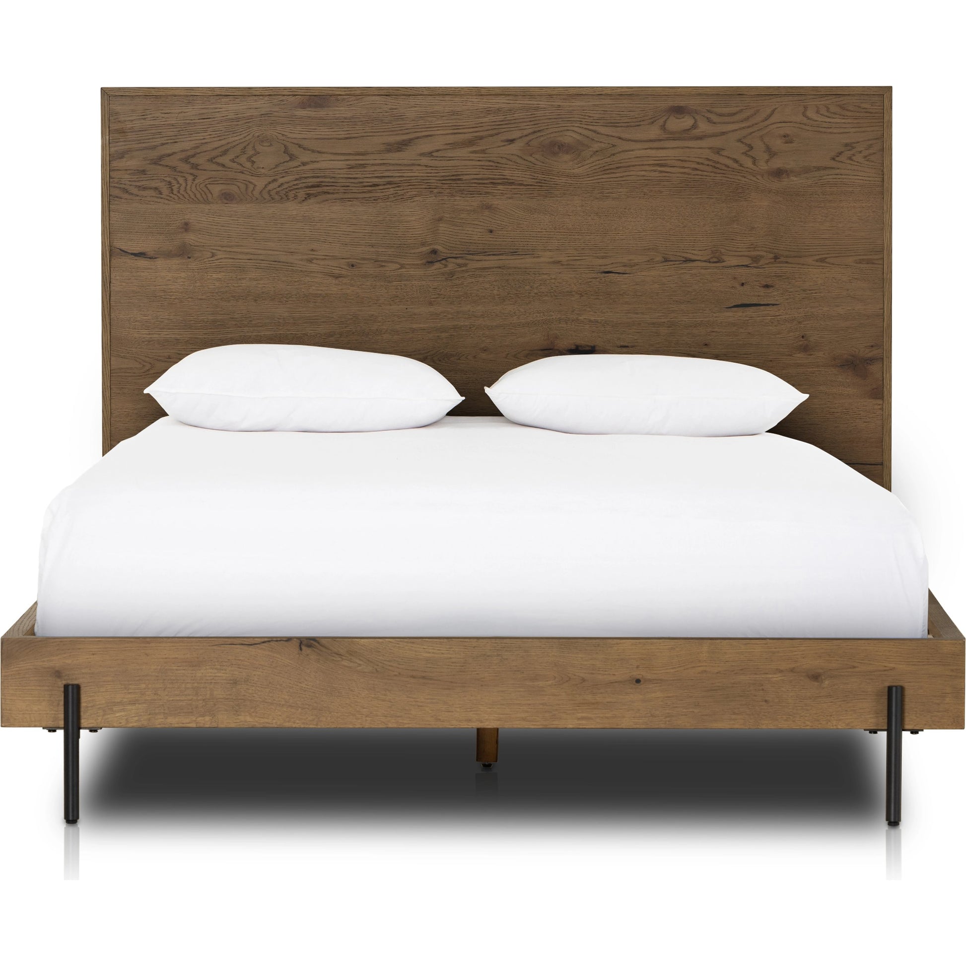 Eaton Bed by Four Hands in amber oak resin. Made from thick oak veneer, iron in a rustic style.