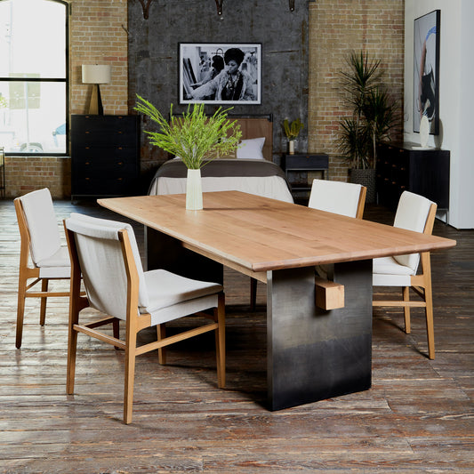Aya Dining Chair by Four Hands in savile flax and natural brown. Made from 92% polyester, 8% flax, linen, solid nettlewood, 100% polyester in a coastal style.