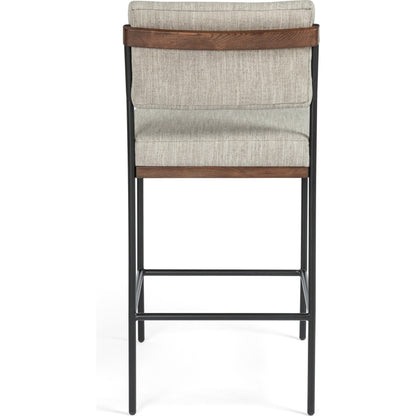 Benton Bar + Counter Stool by Four Hands in savile flannel and almond, midnight iron. Made from 92% polyester, 8% flax, linen, solid nettlewood, iron in a modern style.