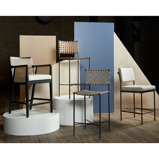 Benton Bar + Counter Stool by Four Hands in savile flannel and almond, midnight iron. Made from 92% polyester, 8% flax, linen, solid nettlewood, iron in a modern style.