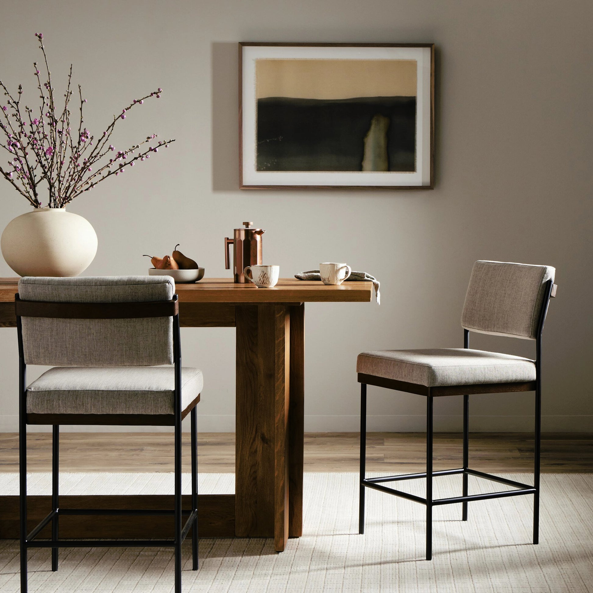 Benton Bar + Counter Stool by Four Hands in savile flannel and almond, midnight iron. Made from 92% polyester, 8% flax, linen, solid nettlewood, iron in a modern style.