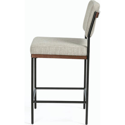 Benton Bar + Counter Stool by Four Hands in savile flannel and almond, midnight iron. Made from 92% polyester, 8% flax, linen, solid nettlewood, iron in a modern style.