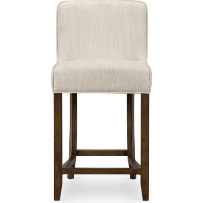 Aria Counter Stool by Four Hands in sienna chestnut. Made from top grain leather, solid nettlewood, 100% polyester in a modern style.