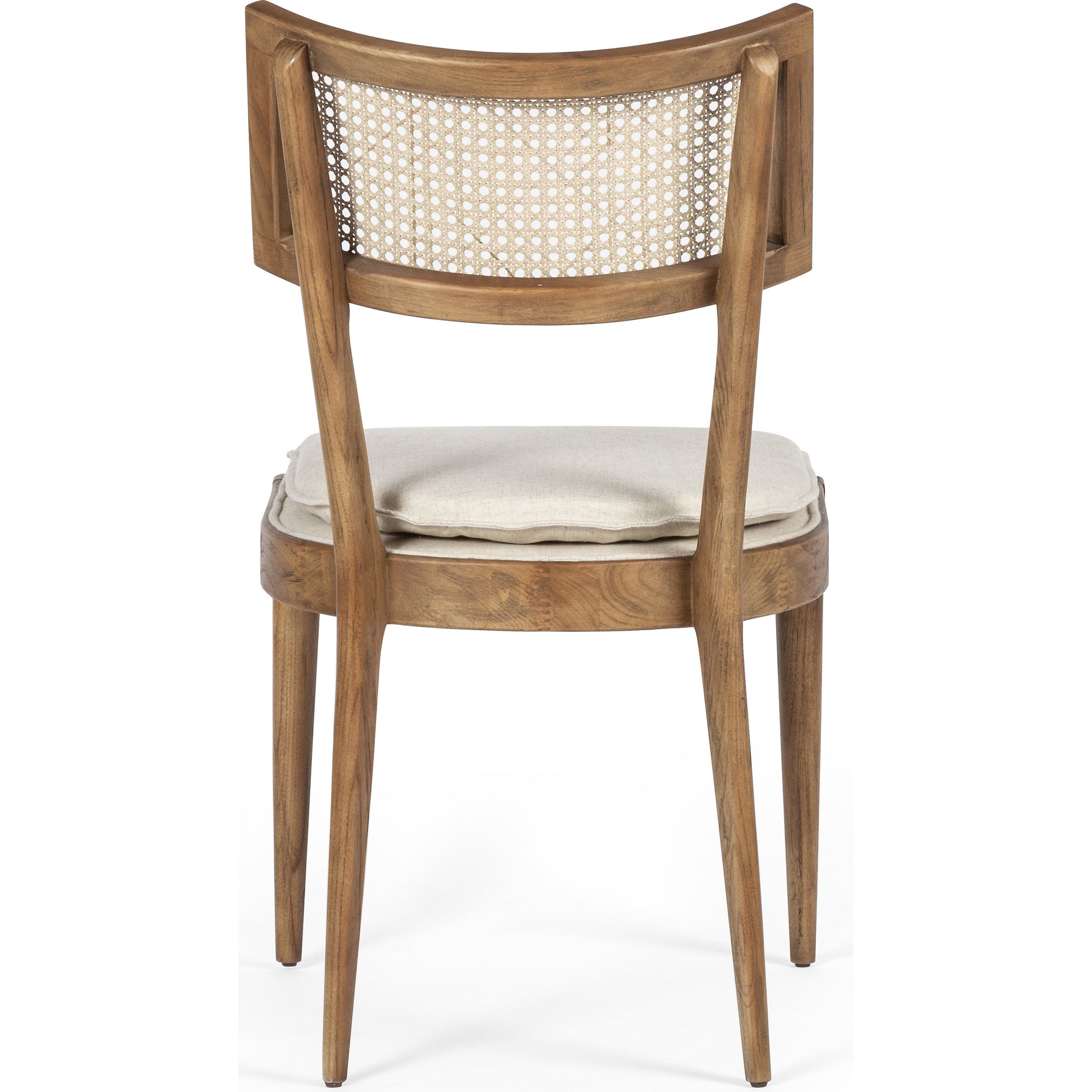 Britt Dining Chair by Four Hands in natural cane, savile flax, brushed ebony. Made from 92% polyester, 8% flax, linen, solid nettlewood, cane in a modern style.