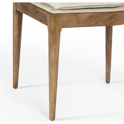 Britt Dining Chair by Four Hands in natural cane, savile flax, brushed ebony. Made from 92% polyester, 8% flax, linen, solid nettlewood, cane in a modern style.