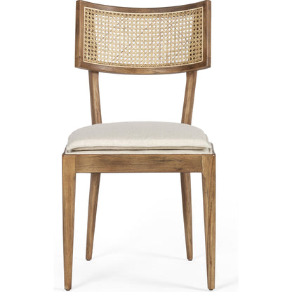 Britt Dining Chair by Four Hands in natural cane, savile flax, brushed ebony. Made from 92% polyester, 8% flax, linen, solid nettlewood, cane in a modern style.