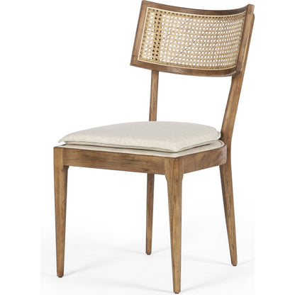 Britt Dining Chair by Four Hands in natural cane, savile flax, brushed ebony. Made from 92% polyester, 8% flax, linen, solid nettlewood, cane in a modern style.