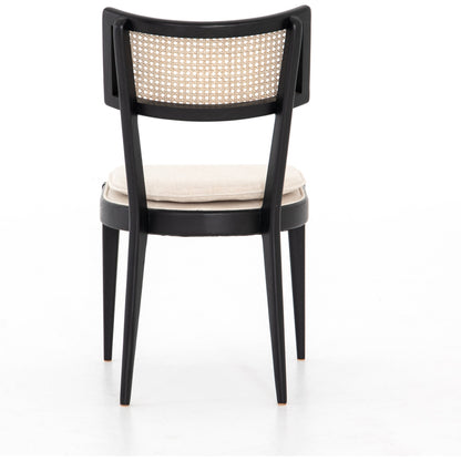 Britt Dining Chair by Four Hands in natural cane, savile flax, brushed ebony. Made from 92% polyester, 8% flax, linen, solid nettlewood, cane in a modern style.