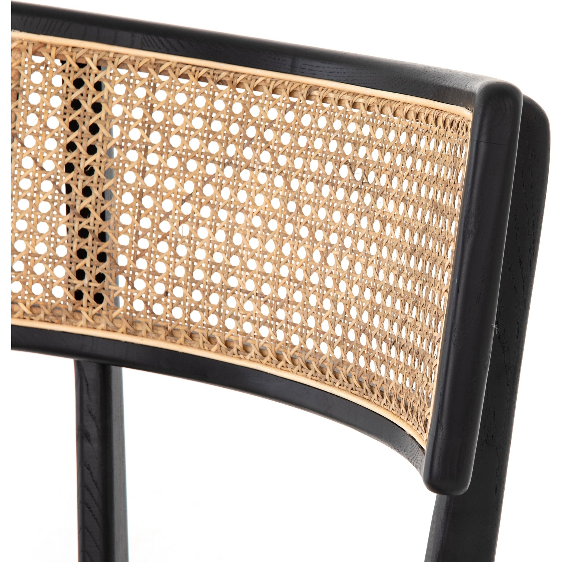 Britt Dining Chair by Four Hands in natural cane, savile flax, brushed ebony. Made from 92% polyester, 8% flax, linen, solid nettlewood, cane in a modern style.