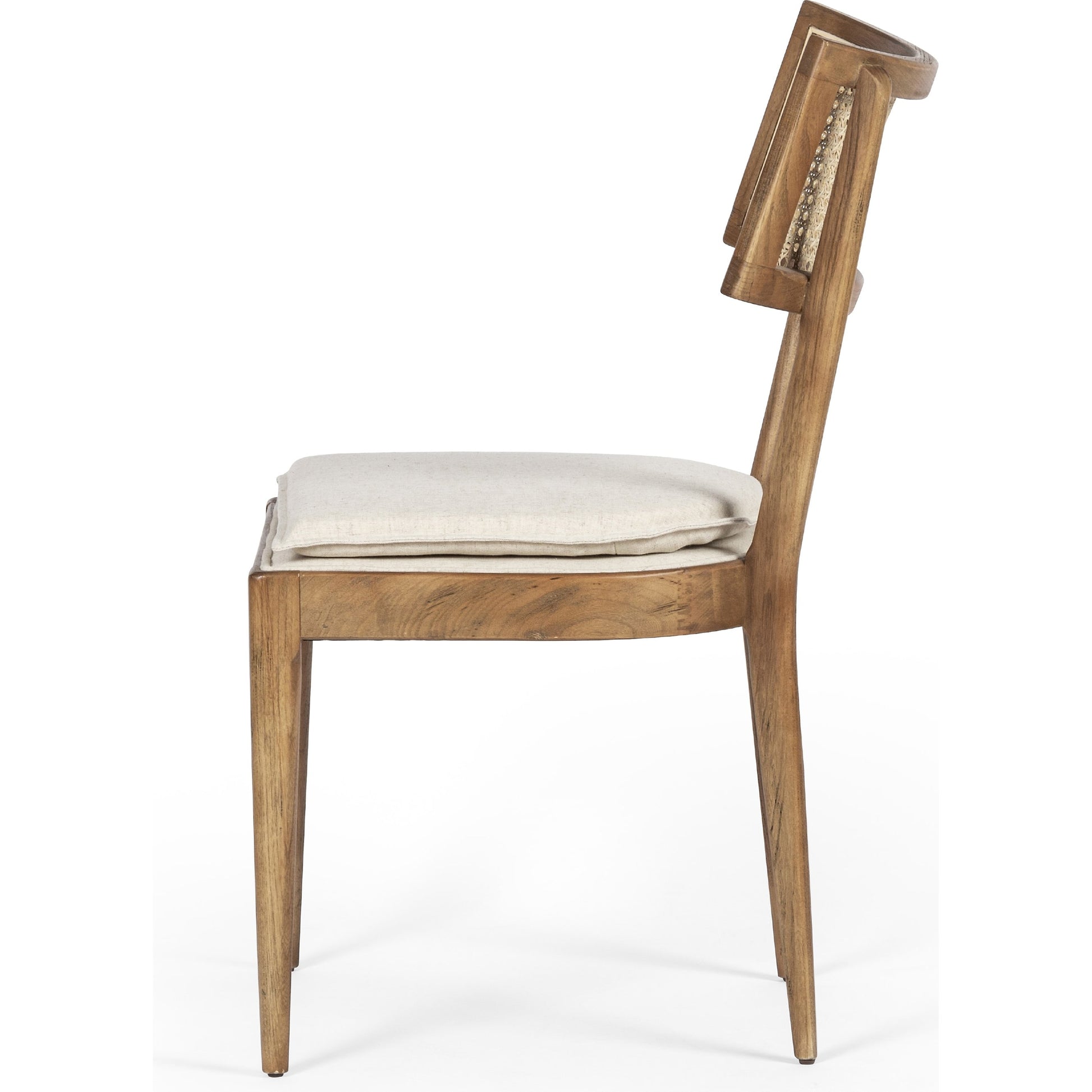 Britt Dining Chair by Four Hands in natural cane, savile flax, brushed ebony. Made from 92% polyester, 8% flax, linen, solid nettlewood, cane in a modern style.