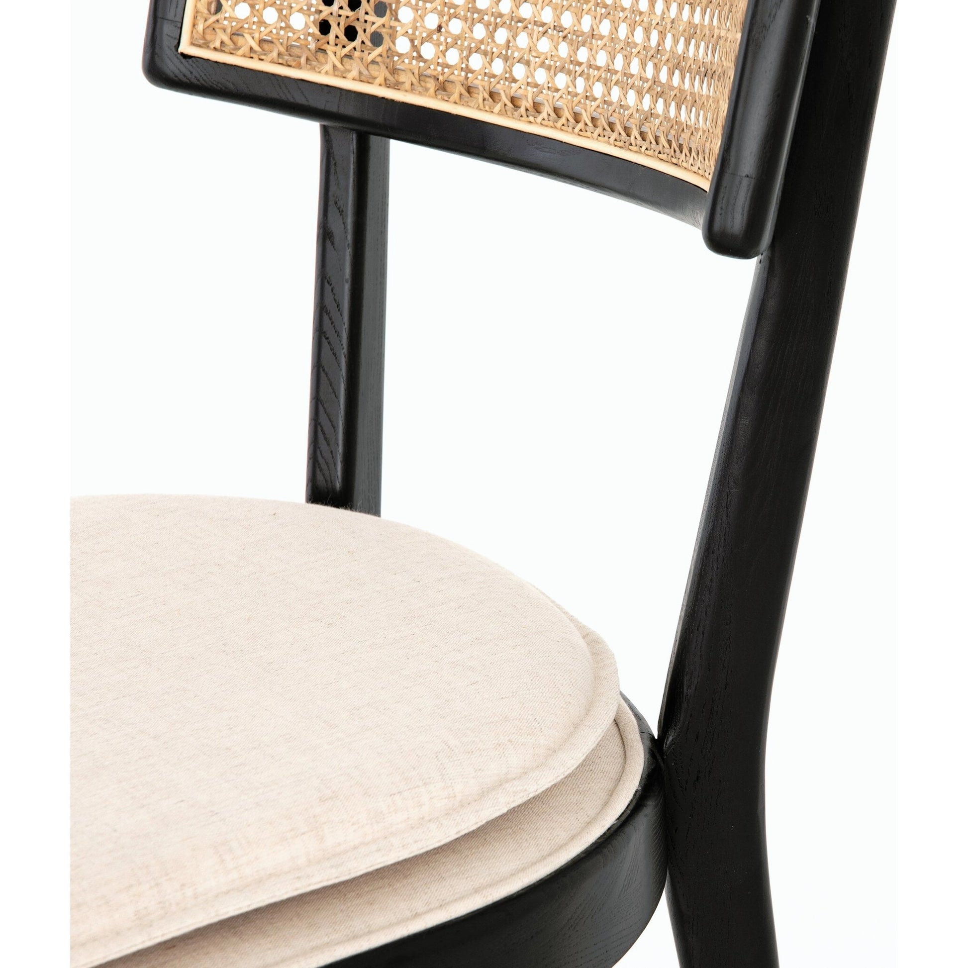 Britt Dining Chair by Four Hands in natural cane, savile flax, brushed ebony. Made from 92% polyester, 8% flax, linen, solid nettlewood, cane in a modern style.