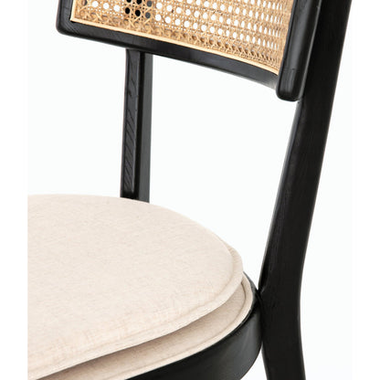 Britt Dining Chair by Four Hands in natural cane, savile flax, brushed ebony. Made from 92% polyester, 8% flax, linen, solid nettlewood, cane in a modern style.