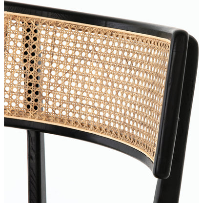 Britt Dining Chair by Four Hands in natural cane, savile flax, brushed ebony. Made from 92% polyester, 8% flax, linen, solid nettlewood, cane in a modern style.