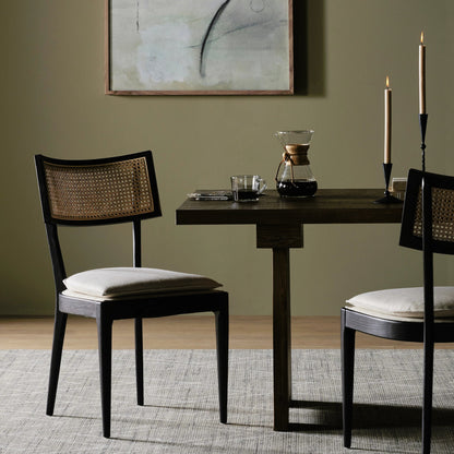 Britt Dining Chair by Four Hands in natural cane, savile flax, brushed ebony. Made from 92% polyester, 8% flax, linen, solid nettlewood, cane in a modern style.
