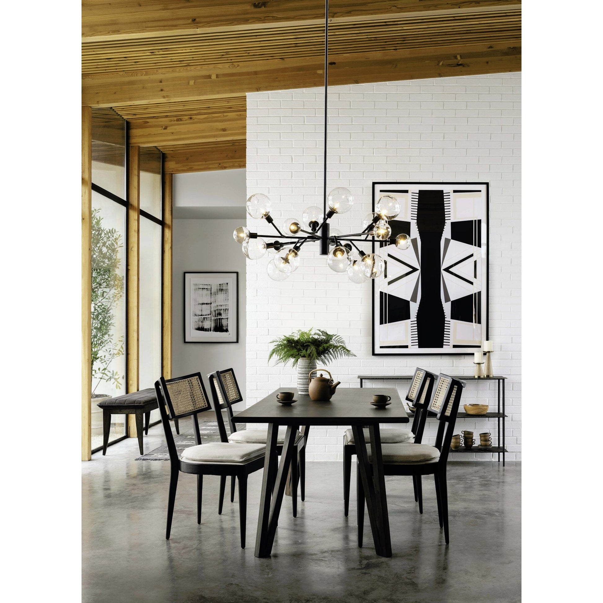 Britt Dining Chair by Four Hands in natural cane, savile flax, brushed ebony. Made from 92% polyester, 8% flax, linen, solid nettlewood, cane in a modern style.